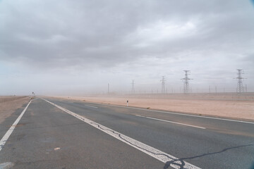 Fototapeta premium electric power station and road in desert