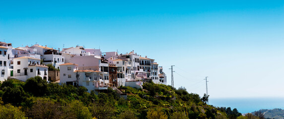 Beautiful view of white buildings in the mountains in a small rural town in the south of Spain