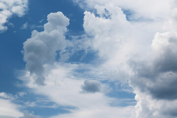 Naklejka na ściany i meble dramatic rainy cumulus clouds background