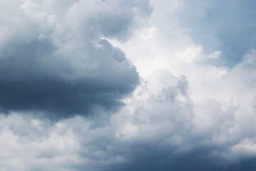 Fototapeta na wymiar dramatic rainy cumulus clouds background