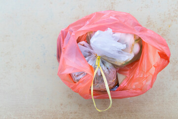 Take away food packed in plastic bags are toxic and environmental unfriendly