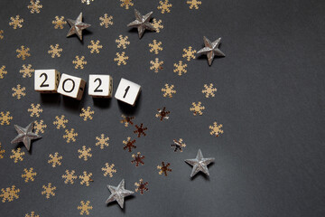 Happy new year 2021 white cubes with numbers and gold stars