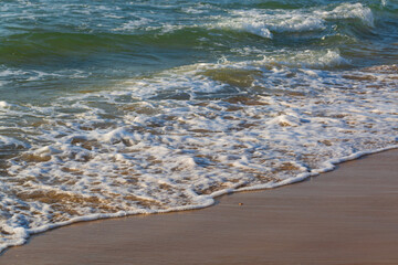 Blue sea wave, white foam, golden sand beach, turquoise sea water close up, summer holidays border frame concept, tropical island vacation backdrop, tourist travel banner design template, copy space