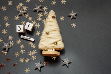 Happy New Year December 31 white cubes with numbers and gold stars and a Christmas tree