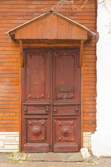 Old wooden door in town