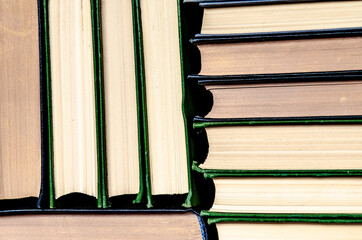 stack of colorful books in a library