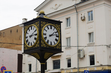 Fototapeta na wymiar Old clock tower in the city of Tver, Russia