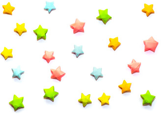 Seamless background in a children's style from multi-colored paper stars. For printing on fabric,...