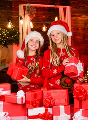 Obraz na płótnie Canvas Happy holidays. Girls friends celebrate christmas. Children cheerful christmas eve. Christmas gifts concept. Shopping before holidays. Pick up perfect present. Sincere emotional kids. Boxing day