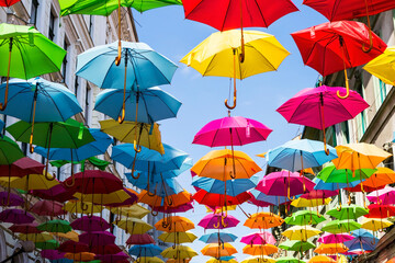 Fototapeta na wymiar Colorful umbrellas, Alba Iulia street in Timisoara, Romania.