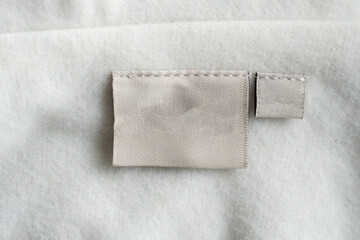 laundry care clothing label on fabric texture