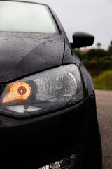 Close up of car in the rain