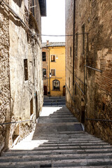 Authentic street in small village in tuscany in Italy