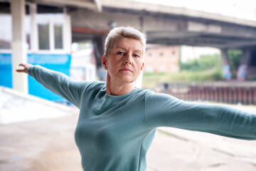 Mature Woman Working Stretching Exercise