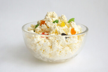 cottage cheese in a bowl with candied fruits