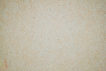 A dense industrial sheet of grey paper with a textured surface