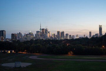 Fototapeta na wymiar Nightview of Toronto City Skyline from Riverdale Park in Ontario Canada