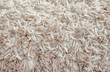 Fleecy fluffy carpet, background, texture.