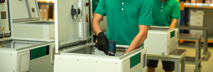 front view factory assembly worker.