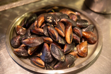 Close-up background of stuffed mussels, selective focus