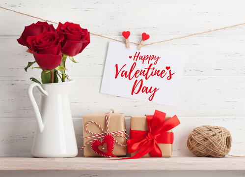 Valentines day card with gifts and flowers