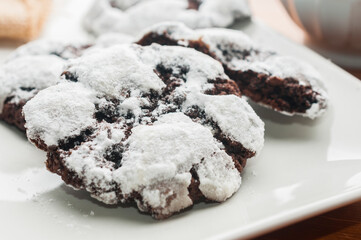 Double chocolate crinkle cookies on white plate