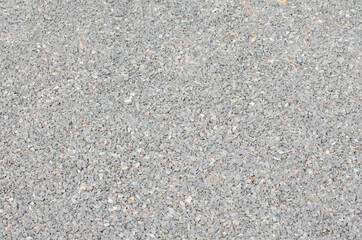 The texture of fine granite chips.