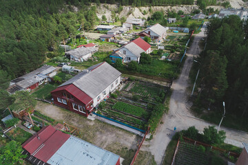 Fototapeta premium Aerial Townscape of Luvenga Town located in Kandalaksha Area in Northwestern Russia on the Kola Peninsula