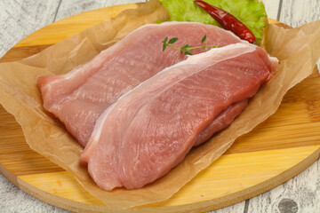 Juicy raw pork steak meat