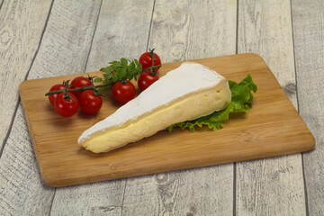 Brie cheese triangle served salad