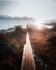 Fotobehang Reinefjorden Man enjoying a sunset in Norway, Lofoten Islands