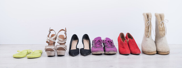 Women's footwear collection for any weather and all seasons. A row of women's shoes