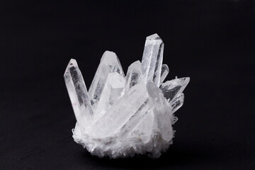Large crystals of natural transparent stone rock crystal close-up, transparent quartz in crystals,...