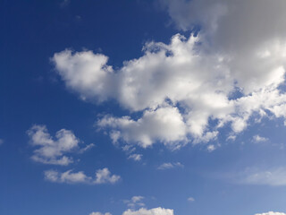 White clouds on a blue sky. Background.