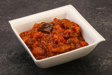 Eggplant saute with tomato and herbs