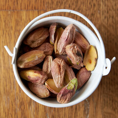 handful of whole and peeled pistachios