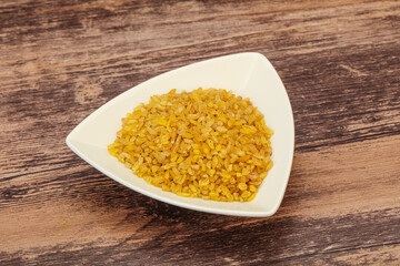 Vegetarian cuisine - dry bulgur for cooking