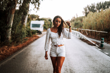 moroccan girl in the dunes of the south of spain and beach coast white tarifa bolonia