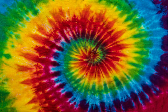 Fashionable Colorful Retro Abstract Psychedelic Tie Dye Swirl Design. © naturalv
