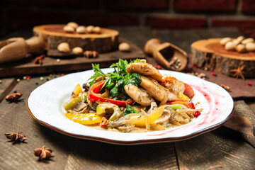 Chicken breast with mushroom sauce and vegetables