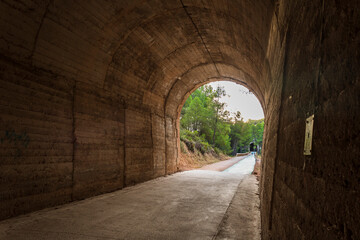 Obraz premium Views of the Alcoi greenway from inside one of its tunnels.