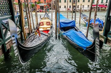 Fototapeta na wymiar Gondolas moored in Venice, Italy.