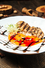 Chicken breast with pea mash and pumpkin seeds
