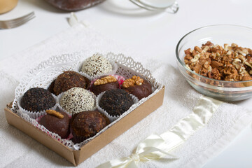 Cardboard packaging with dried fruit and nuts sweets. Made at home in self-isolation during the epidemic.