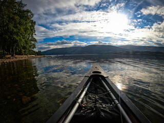 View from a canoe paddling across the Great Glen Way in Scotland