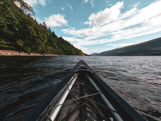 Fototapeta premium View from a canoe paddling across the Great Glen Way in Scotland