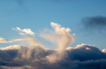 Cloudscape against a blue sky