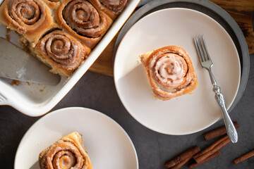 Fresh baked homemade cinnamon rolls with icing, real autumn vibes
