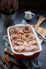 Fresh baked homemade cinnamon rolls with icing, real autumn vibes