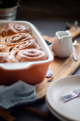 Fresh baked homemade cinnamon rolls with icing, real autumn vibes